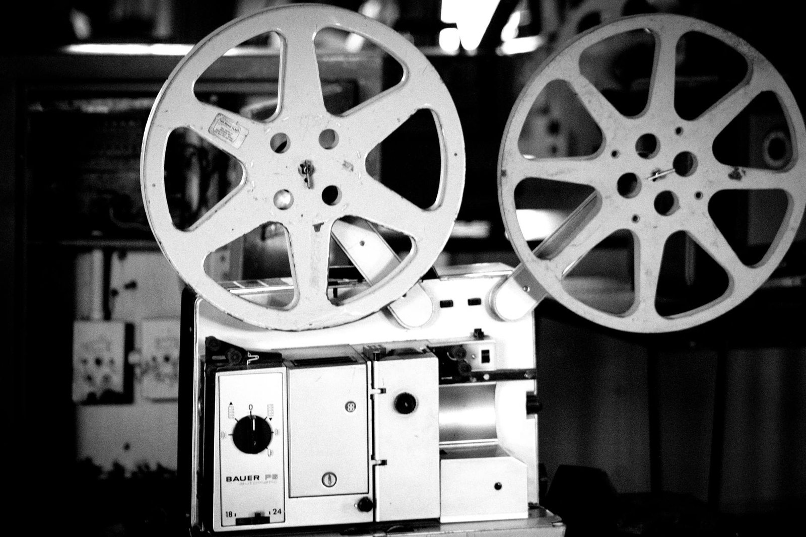 Black and white vintage film projector representing the foundation's film club